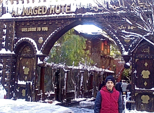 Al-Majed Hotel in the snow, and my friend's son 